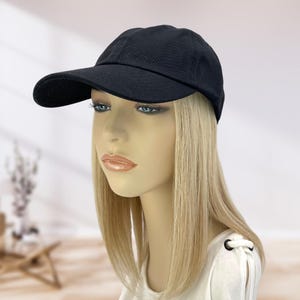 100% Human Hair! Chemo Hat. Women's black baseball hat with Hair attached. Perfect for those who have lost their hair due to chemotherapy