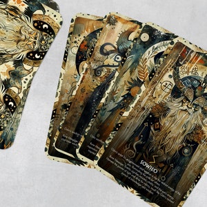 May include: A set of five tarot cards with intricate illustrations and text. The cards feature a dark background with gold and silver accents. The text on the cards includes the word "SOWILO" and a description of the card's meaning.