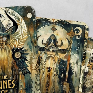 May include: Three illustrated cards with a watercolor style featuring a bearded man in a horned helmet with a large beard and a crown. The text on the card reads "The Runes of".
