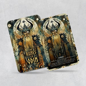 May include: A card from The Runes of Odin deck, featuring a detailed illustration of a bearded figure wearing a horned helmet and a cloak. The card is titled "Ansuz" and includes a description of the rune's meaning.