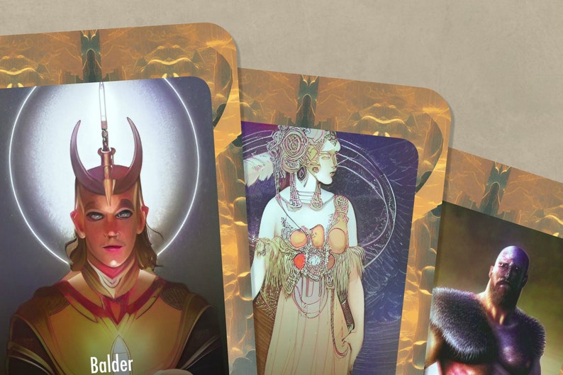 May include: Three illustrated cards with gold frames and ornate designs. The first card features a person with a crown and the word "Balder" at the bottom. The second card features a woman with a headdress and a long, flowing gown. The third card features a man with a beard and a fur-lined garment.