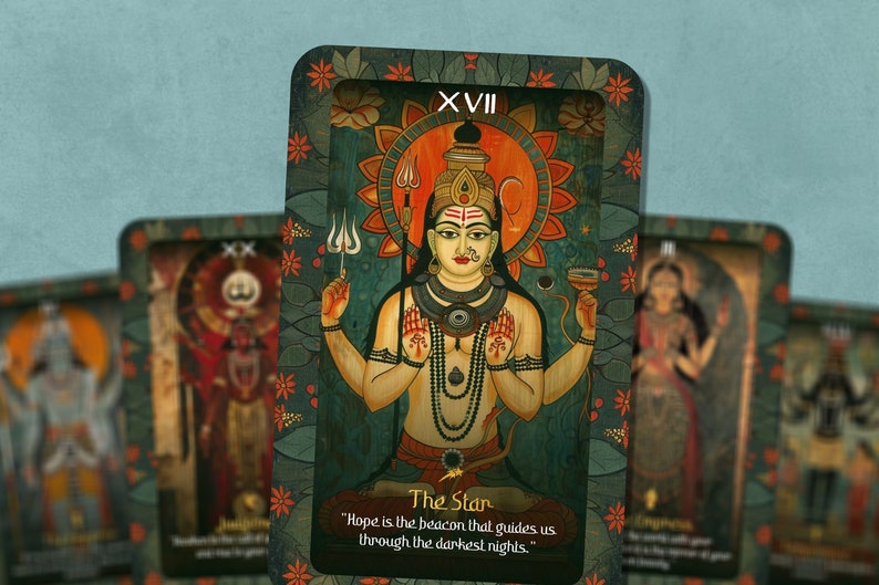 May include: A tarot card with a green background and a gold frame. The card depicts a Hindu deity with four arms, holding a trident and a bowl. The card is numbered XVII and titled "The Star". The text below the image reads "Hope is the beacon that guides us through the darkest nights."
