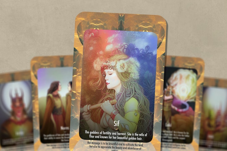 May include: A card with a golden border and a colorful background featuring a woman with long blonde hair wearing a crown of flowers. The text on the card reads "Sif, The goddess of fertility and harvest. She is the wife of Thor and known for her beautiful golden hair. Her message is to be bountiful end to cultivate the land, but also to appreciate the beauty and abundance of"