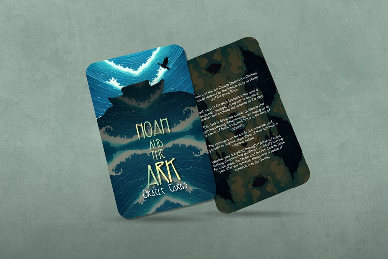 May include: A blue and gold oracle card with the text "Noah and the Ark Oracle Cards". The card features a stylized illustration of a boat on a stormy sea with a bird flying overhead.