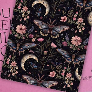 May include: A dark background with a repeating pattern of moths, flowers, and crescent moons. The moths are a dark brown with light brown markings and have large, feathery antennae. The flowers are pink, white, and purple. The crescent moons are gold.