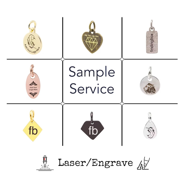 May include: A collection of nine different metal charms with various designs, including a heart, a lion, a diamond, a teardrop, and a square. The charms are all silver or gold in color and have different engravings, including "Add Your Logo Here", "findingbox", and "fb".