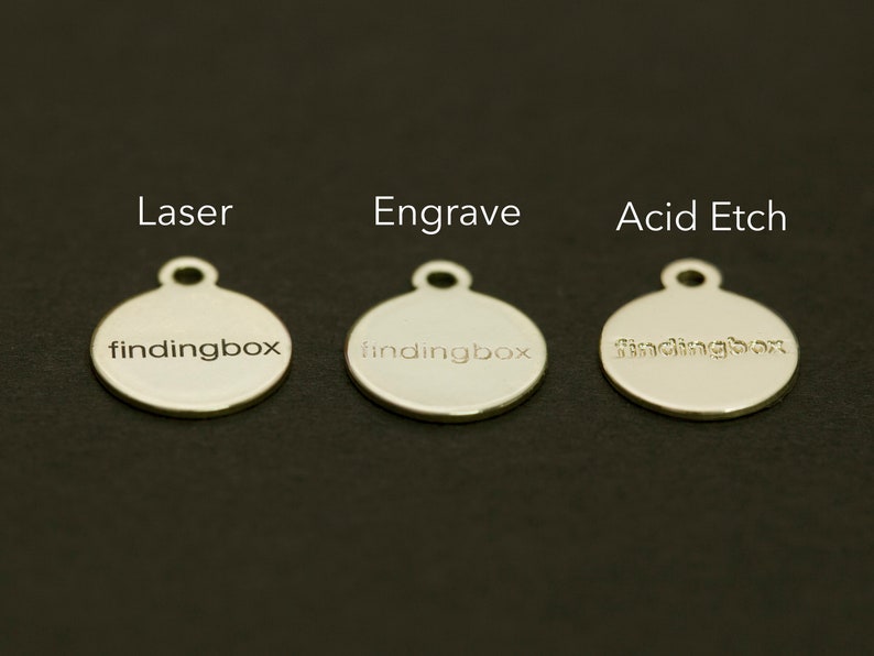 May include: Three silver round tags with the text "findingbox" engraved on them. The tags are labeled "Laser", "Engrave", and "Acid Etch" to show the different engraving methods.
