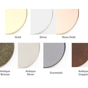May include: A close-up of eight different metal finishes: gold, silver, rose gold, antique bronze, antique silver, gunmetal, and antique copper. Each finish is shown as a half-circle.