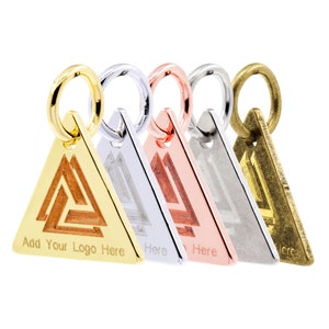 May include: Four triangle-shaped metal charms in gold, silver, rose gold, and brass. Each charm features a geometric design and a ring for attaching to a necklace or bracelet. The charms are arranged in a row, with the gold charm at the front and the brass charm at the back. The text "Add Your Logo Here" is engraved on the gold charm.