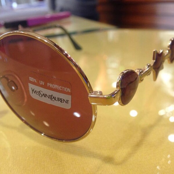 RESERVED >> YSL Yves Saint Laurent round golden metal sunglasses, with brown tinted lenses, one of a kind chained stars and hearts temples
