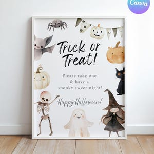 May include: A framed Halloween sign with watercolor illustrations of a bat, spider, pumpkins, ghost, skeleton, and witch. The sign reads "Trick or Treat!" and "Happy Halloween!" in black script.