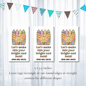 May include: Three rectangular tags with a retro design. Each tag features a crayon box, a smiling flower, and a rainbow. The text reads "Let's make this year bright and bold!" and "FROM MRS SMITH". The tags are 2 x 3.5 inches.