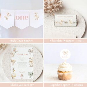 May include: Party supplies with a duck theme. The set includes a high chair banner with the word "one", a chocolate wrapper, a thank you card, and a cupcake topper. The designs feature duck illustrations and bows in watercolour.