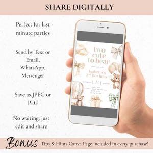 May include: A smartphone displays a digital invitation with the text "two cute to bear" for Isabella's 2nd birthday. The invitation features teddy bears, balloons, and bows in soft pastel colors. The phone is held in a hand.