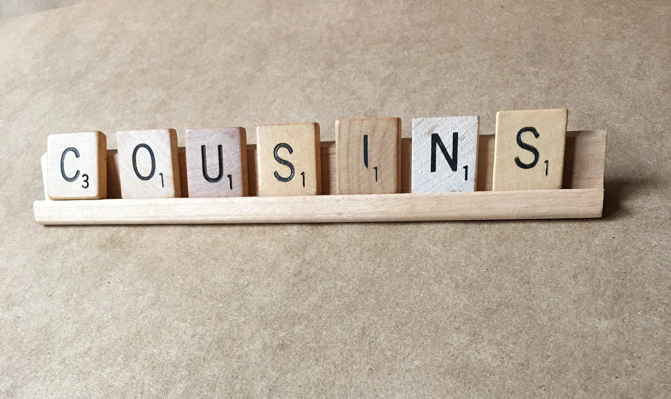 Set of four 8 X 10 Picture Mats spell cousins in holographic red letters