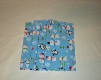 Napkins - Snowmen and Penguins on a Blue Background - Set of 4