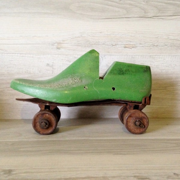 Vintage Green Resin Shoe Last and Rusty Vintage Rollerskate