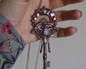 Magical key pendant with moonstone and peridot, whimsical jewellery