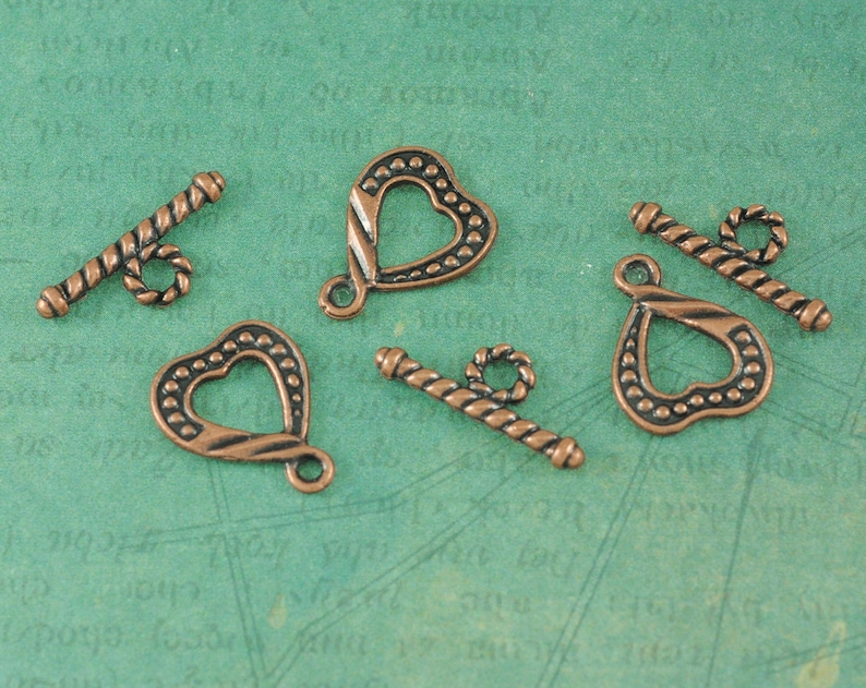 Measures 58 Package of 6 Sets Twisted Heart Antique Copper Toggles