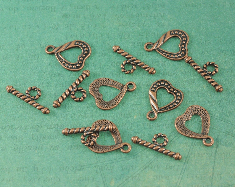 Measures 58 Package of 6 Sets Twisted Heart Antique Copper Toggles