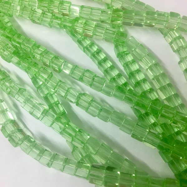 6mm peridot green glass cubes- full 16in strand- approximately 59 beads
