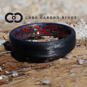 Carbon fiber unidirectional ring with multi sparkle inside