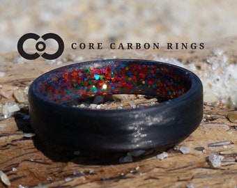 Carbon fiber unidirectional ring with multi sparkle inside