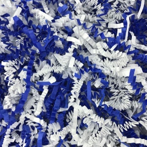 Pu&ograve; includere: Carta crespa blu e bianca, comunemente usata come materiale di imballaggio per regali e oggetti fragili.