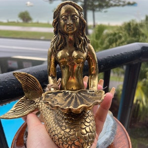 Brass mermaid. 18 cm. X 16 cm