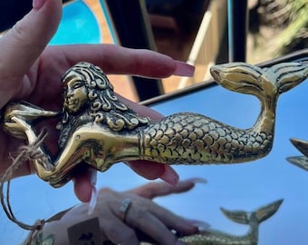 Small brass mermaid statue