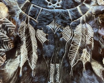 Hand carved goat skin