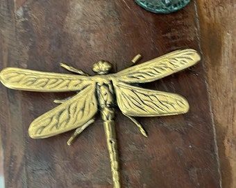 Brass dragonflies