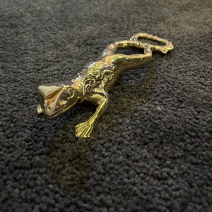 Engraved brass frog bottle opener