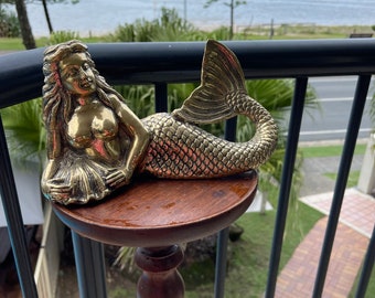 Mermaid laying on side