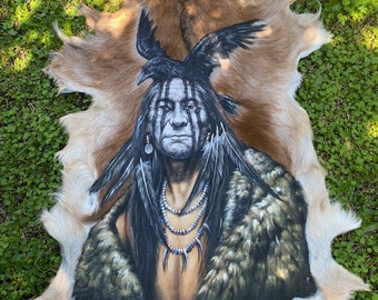 Hand painted goat skin.