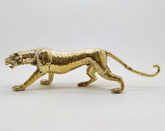 Large brass leopard.