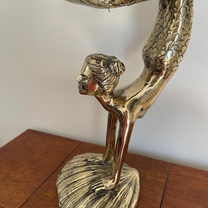 Mermaid hand standing