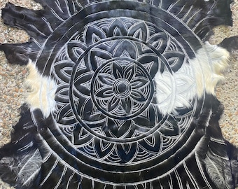 Black and white mandala hand carved goathides.