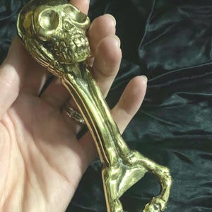 Gold skull bottle opener