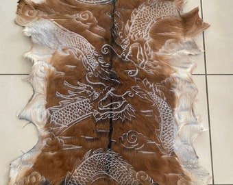 Dragon hand carved goat skin