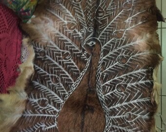 Peacock design Handcarved goat skin