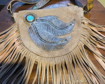 buckskin feather fringed bag