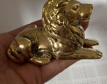 Small brass lion