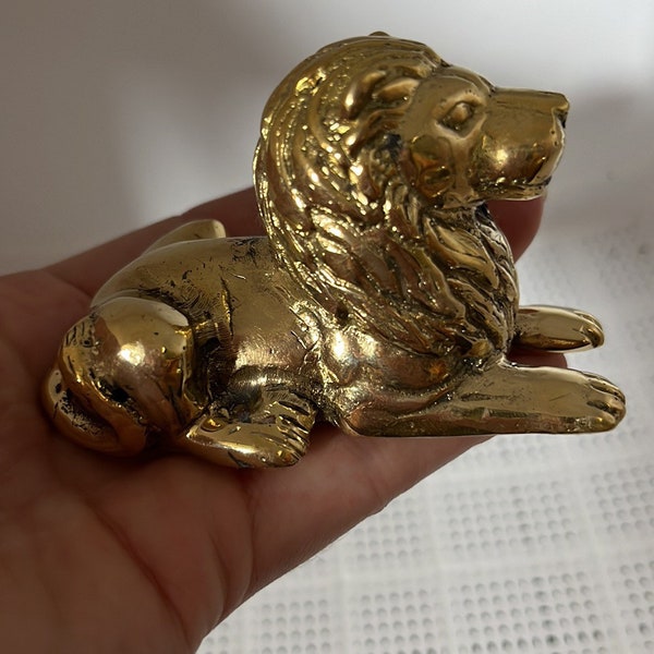 Small brass lion