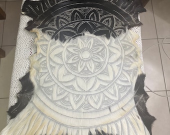 Black and white mandala goatskin.