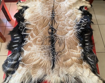 Handcarved goatskin