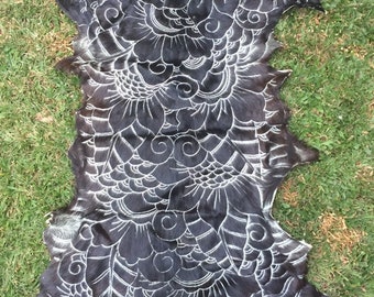 Handcarved goatskin