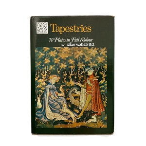 May include: A book titled "Tapestries" with a green cover and a colorful image of a man and woman in a forest setting. The book features 70 plates in full color and is for Allan Waller Ltd.