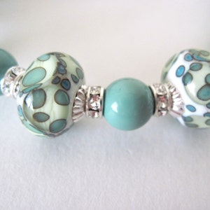 Turquoise Glass and crystal Bracelet.
