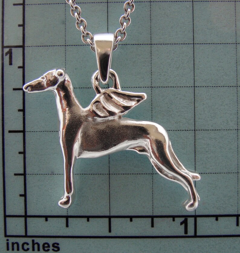 silver whippet statue